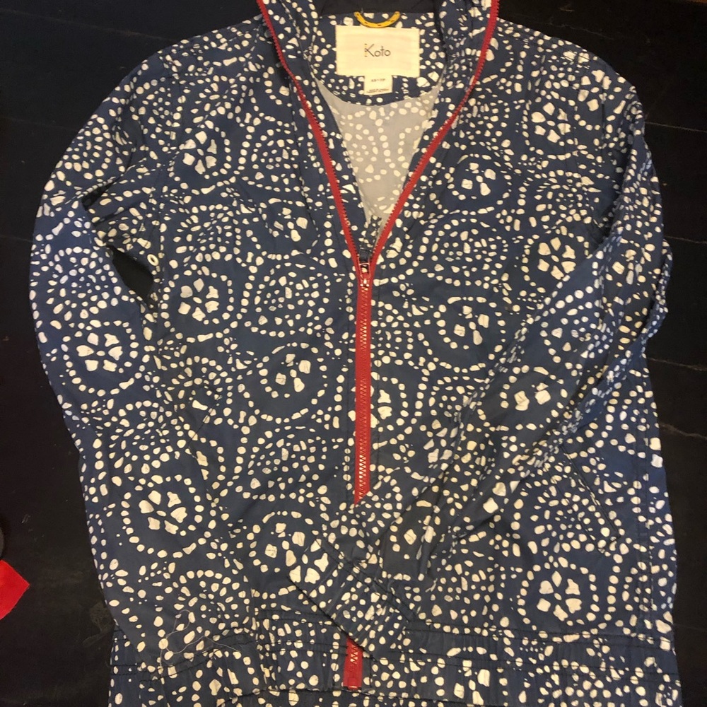 Light rain jacket with hood.